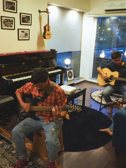 A wide shot of a jam session during a corporate workshop. Our entire space transforms into a creative playground for these events.