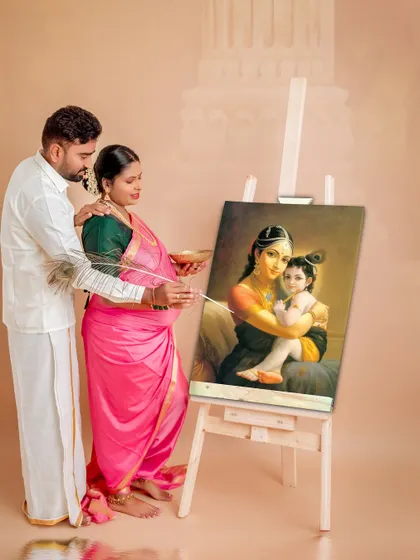 The partner joins in, adding his touch to the divine painting. This shot symbolizes their shared role in creating and nurturing a new life, rooted in faith and tradition.