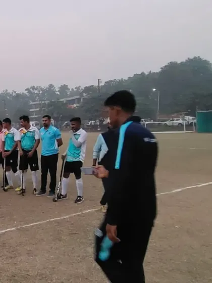 An umpire from our club overseeing a match. Their presence on the field ensures that the game is played in the right spirit.