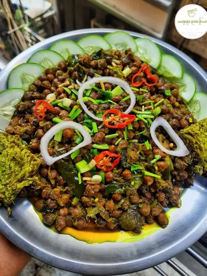 My 'Kelichana paknam machet', a spicy chickpea snack served with savory cakes. It's a traditional and very popular evening snack in Manipur.