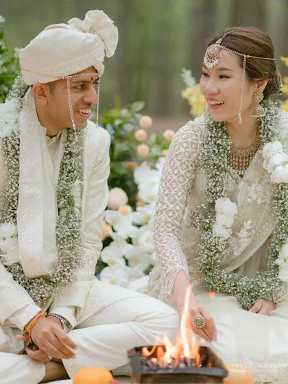 Sharing a smile during their wedding ceremony in Japan. This image captures the blend of cultures and the pure happiness of the couple.