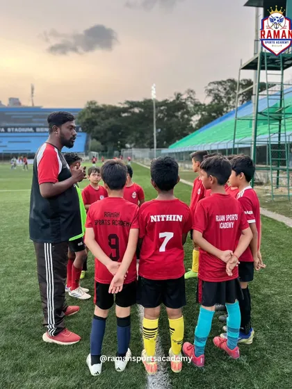 A pre-game huddle with our U11 team at the KSPA Stadium, where the coach sets the strategy and motivates the players.