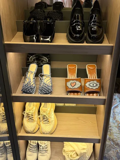 Unique and stylish footwear deserves to be seen. We arrange shoes on open shelves to highlight their design, making them part of the room's decor.