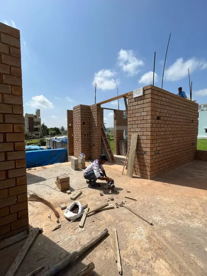 More scenes from our construction sites. These images document the journey of building, from laying rebar and curing concrete to the meticulous work of masonry, all part of bringing a sustainable home to life.