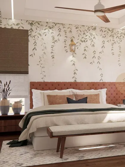 A render for an upcoming master bedroom project. The design includes a beautiful foliage-themed wallpaper behind the bed, an upholstered headboard in a warm terracotta color, and natural wood furniture for an earthy and calming feel.