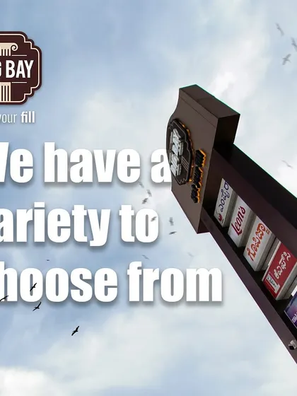 Our brand pylon stands tall against the sky, giving you a preview of the variety you can choose from.