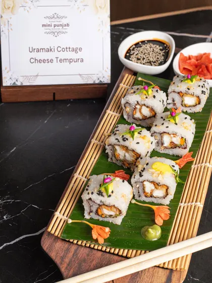 Our Uramaki Cottage Cheese Tempura sushi offers a unique vegetarian twist on a Japanese classic. The crispy tempura filling provides a delightful crunch, making it a favourite among guests.