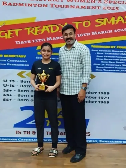 Another champion from the WCG Women's Special Tournament posing with her trophy and me.