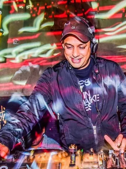 In the zone at the DJ console, feeling the energy of the room. This is where I am most at home, mixing tracks and interacting with the crowd to create a dynamic and responsive live music experience.
