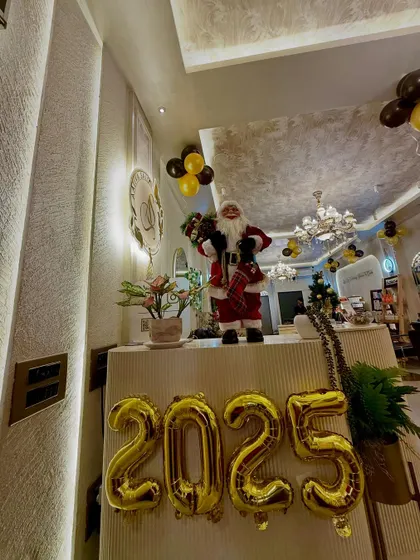 A closer look at our front desk, decorated to welcome clients for the new year. We believe in creating a positive and celebratory vibe in the salon.