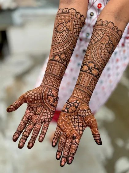 Another view of this elegant design, showing the beautiful details on the back of the hands.