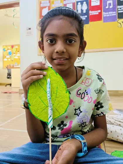 Another happy camper with her moving caterpillar craft. These projects are designed to be fun to make and even more fun to play with afterward.