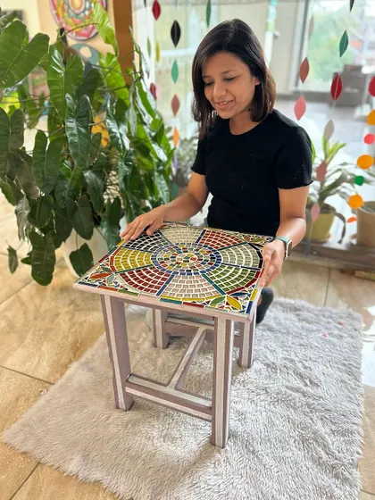 This upcycled mosaic table is a great example of how we can combine different art forms to give old furniture a new purpose.
