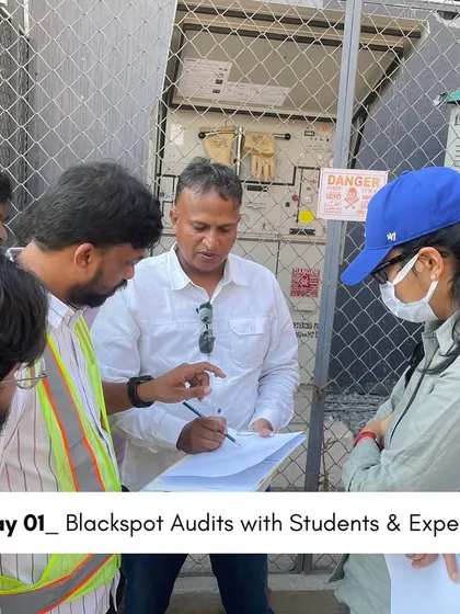 A road safety auditor and students during a field audit, discussing actionable interventions based on direct observation and expert insights.