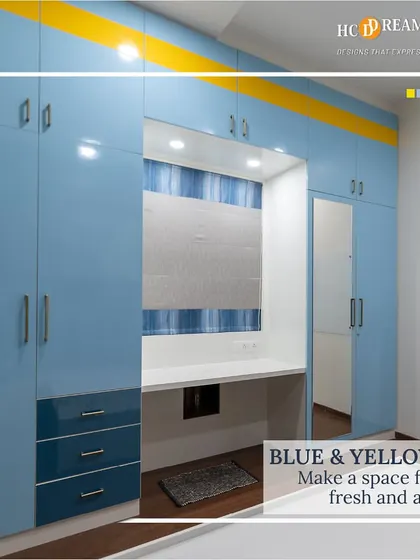 A bright and cheerful room featuring a blue and yellow color combination. The high-gloss finish on the floor-to-ceiling wardrobe makes the space feel fresh and airy.
