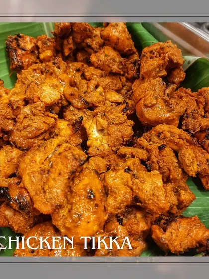 A platter of our signature Chicken Tikka, fresh off the grill. This dish is a guaranteed crowd-pleaser at weddings, corporate events, and festive parties.