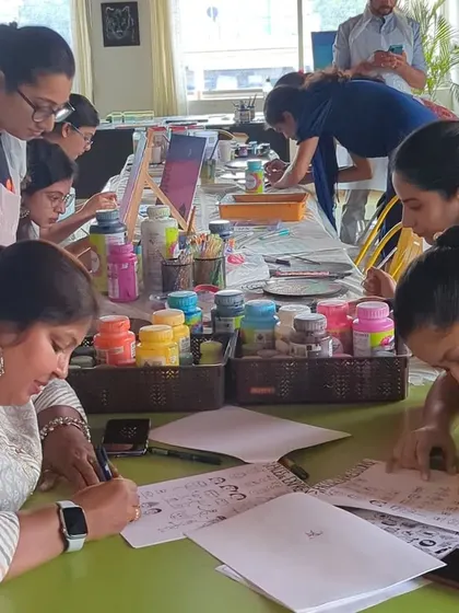 Participants engrossed in a doodling and calligraphy session. The focus and fun are what our workshops are all about.