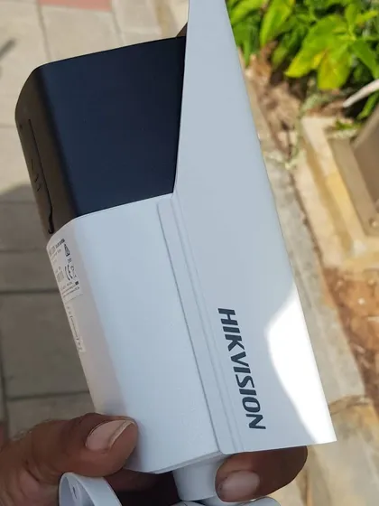 Another angle of the Hikvision bullet camera, highlighting its sturdy design suitable for outdoor installations.