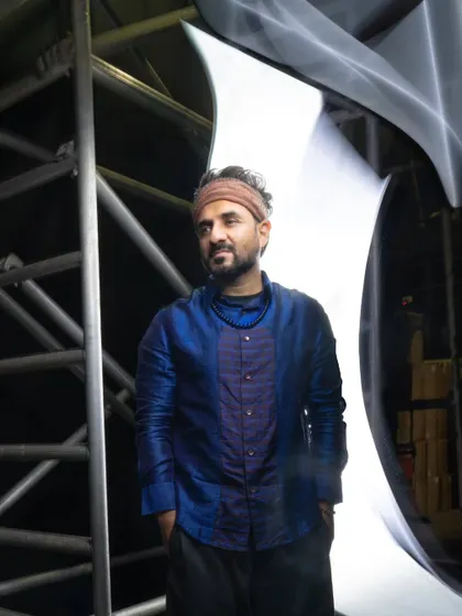 Emmy award winner Vir Das in a striking blue and purple silk kurta by Mandira Bansal. We styled this look for his show in Chennai, creating an outfit that was both comfortable for the stage and visually captivating.