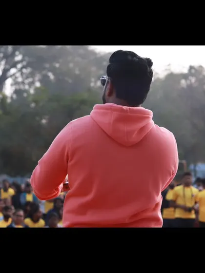 A shot from behind, facing the crowd at the CRY walkathon. This perspective shows my connection with the audience and my role as their leader.