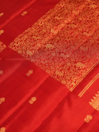 A closer look at the pallu, where the intricate weaving of the animal motifs is clearly visible, showcasing the skill of our artisans.