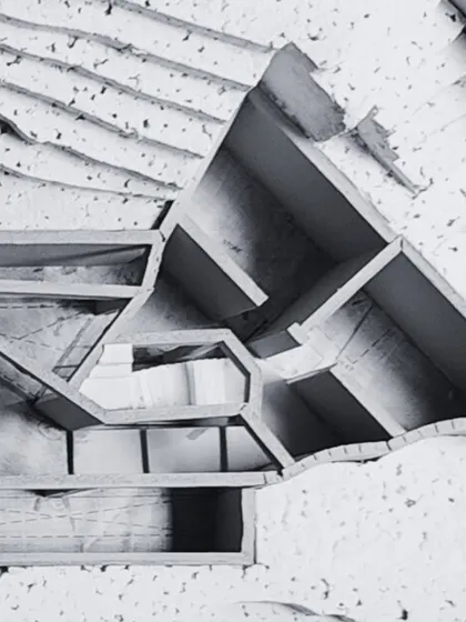 A cross-section view of the hillside study model. This perspective reveals the multi-level design, showing how the basement and other spaces are embedded within the earth to minimize the building's visual impact.