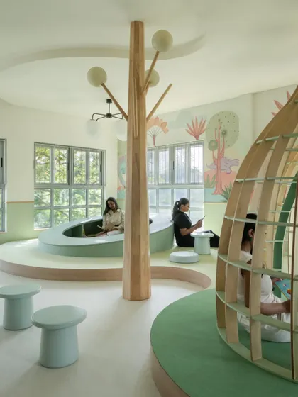 Welcome to the dream library we created for the nursery students at Sri Kumaran School. With whimsical reading pods, a central tree-like structure, and cozy, curved seating, this space is designed to make reading a magical adventure. It’s a sunlit, gentle world built to nurture bright little minds.