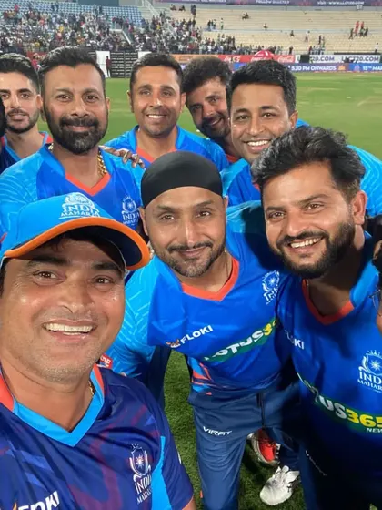 A selfie capturing the camaraderie and joy of the India Maharajas team, featuring Pravin Tambe alongside other cricket legends like Harbhajan Singh and Suresh Raina.