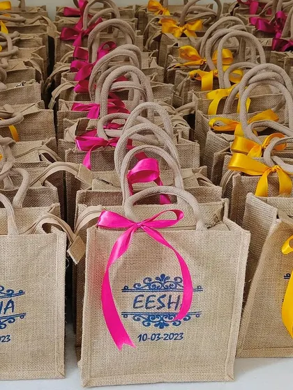 A wide shot of the custom jute bags, showcasing the scale of the order.