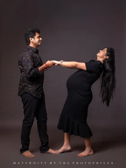 A playful and happy moment between the couple in our studio. We love capturing your real vibe and the goofy laughter you share.