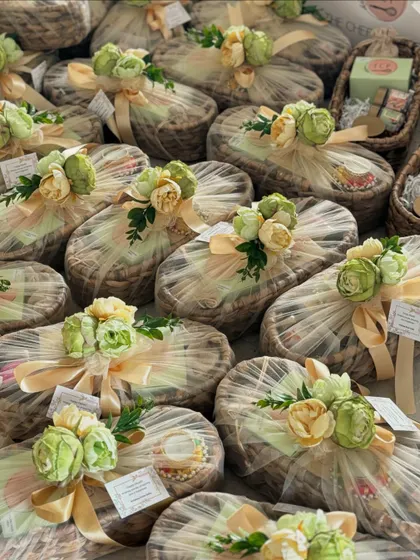 We love seeing our handcrafted baskets all lined up and ready to go. Each one is wrapped and decorated by hand by our amazing all-women team.