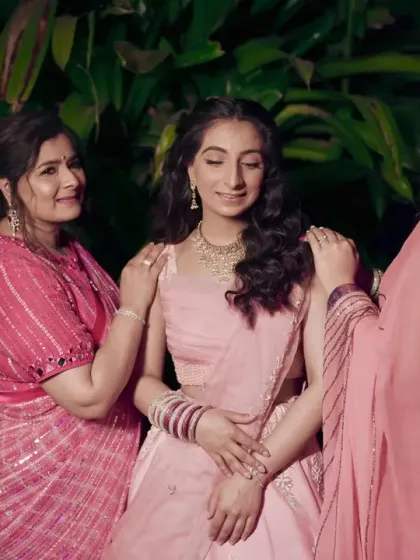 The bride with her mother and sister, a beautiful portrait of three generations.