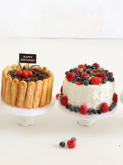 Another shot of the beautiful cake collection, showing the variety and artistry involved.