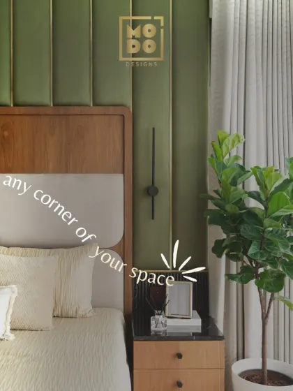 We believe every corner of your space should feel special. Here, a fiddle leaf fig and carefully chosen decor on the nightstand enhance the serene atmosphere of the bedroom.
