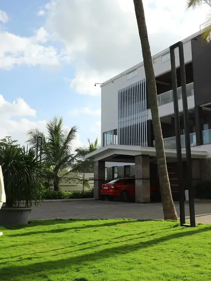 A healthy lawn is the anchor for a home's landscape. My work includes complete turf care, from mowing and edging to soil treatment, ensuring a lush, green foundation for this modern residence.