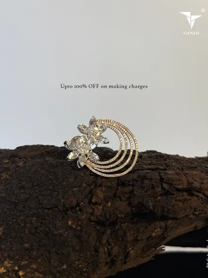 This diamond brooch, with its floral and crescent design, is a versatile piece that can add a touch of sparkle to any outfit. A perfect festive gift.