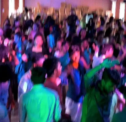 A candid shot of the students having a great time at their college fest.