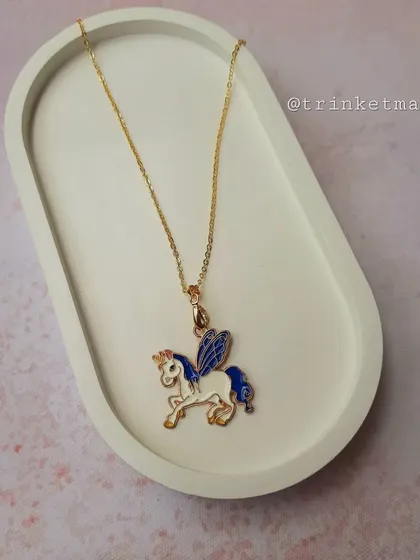 Another winged unicorn (Pegasus) charm necklace, this time with majestic blue wings. A truly magical piece.