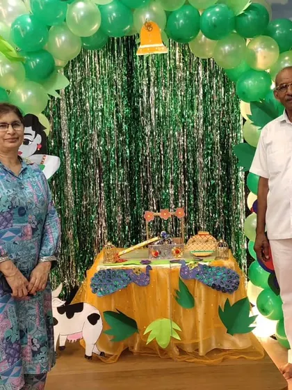 Grandparents join in the fun, posing at our Janmashtami photo booth. Our family-friendly events are designed for all generations to enjoy.
