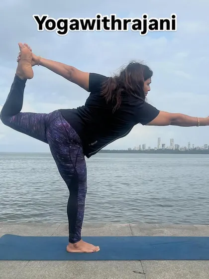 Here I am in Natarajasana, the Lord of the Dance Pose, against the Mumbai skyline. This challenging balance pose builds focus and strength. I invite you to join my morning or evening batches to improve your health and lifestyle.