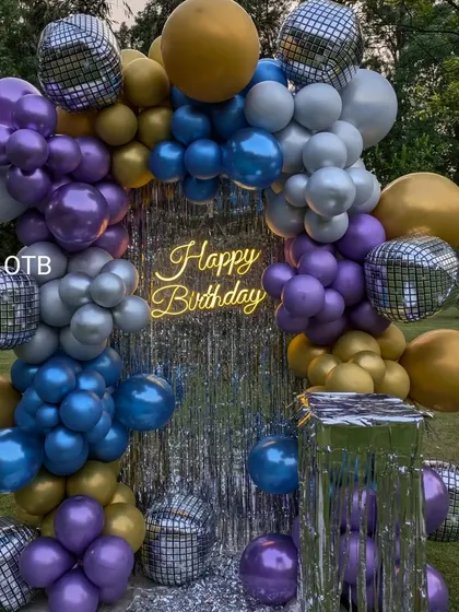 Another perspective of the groovy outdoor birthday setup, perfect for a garden or backyard party.