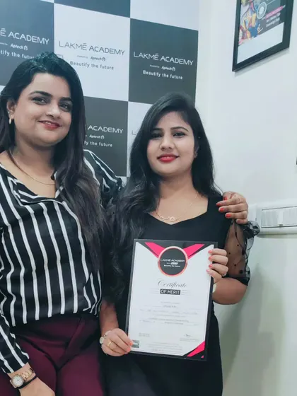 A proud moment with one of my graduating students. Mentoring and guiding students on their journey to becoming professional artists is the most rewarding part of my job.
