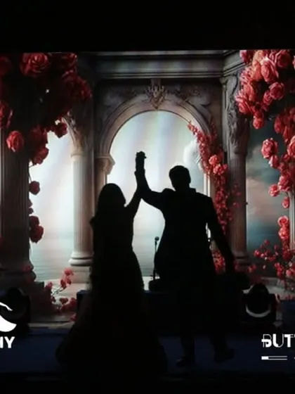 My current obsession with this visual. A stunning silhouette of a couple against a backdrop of red roses, perfect for a romantic performance.