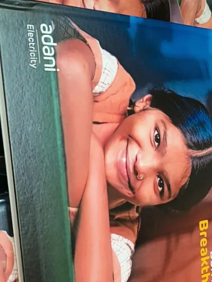 A custom-branded box for Adani Electricity, part of the Women's Day gifting project. The packaging prominently features the company's branding and event theme, ensuring a cohesive brand message.