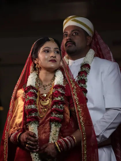 A close-up of the couple. The bride's makeup is perfectly blended and enhances her natural beauty, looking stunning even in close-up shots.