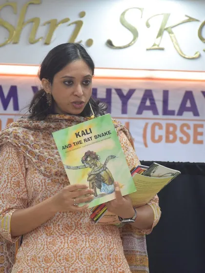 Sharing my favorite picture books is a key part of my workshops for parents and educators. Holding up a book like 'Kali and the Rat Snake' helps demonstrate how powerful visuals and narratives can be used to discuss important themes.