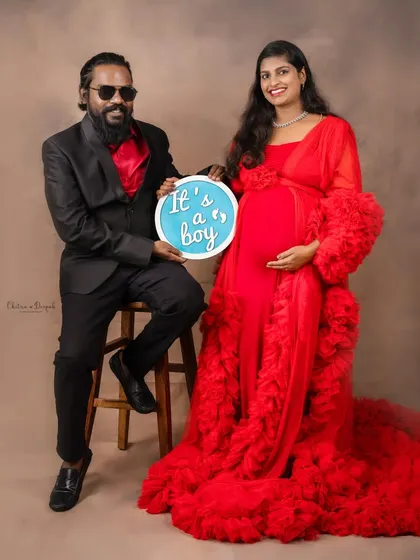 A fun gender reveal moment! This couple is all smiles as they announce they are expecting a boy.