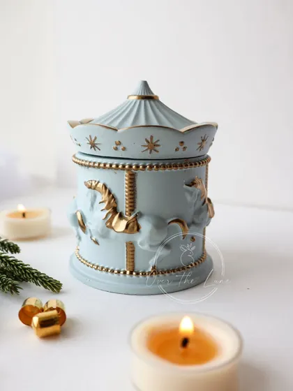 The pastel blue merry-go-round jar, perfect for a dreamy, aesthetic room.