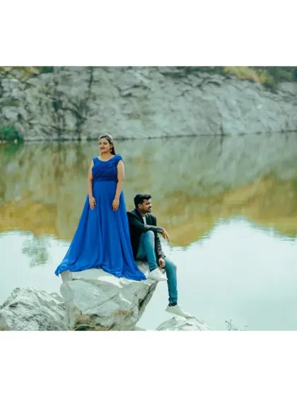 A duplicate of ID 99, this shot showcases the bride's elegant blue dress against the rugged beauty of the quarry.