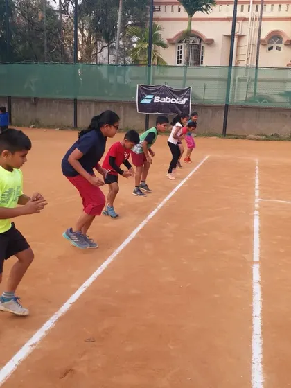Our junior players get ready for a sprinting drill, building the explosive speed needed to chase down balls on the court.